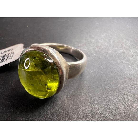 SOLD 

NEW size 7 oval peridot sterling silver ring 6.20 grams - Picture 12 of 15